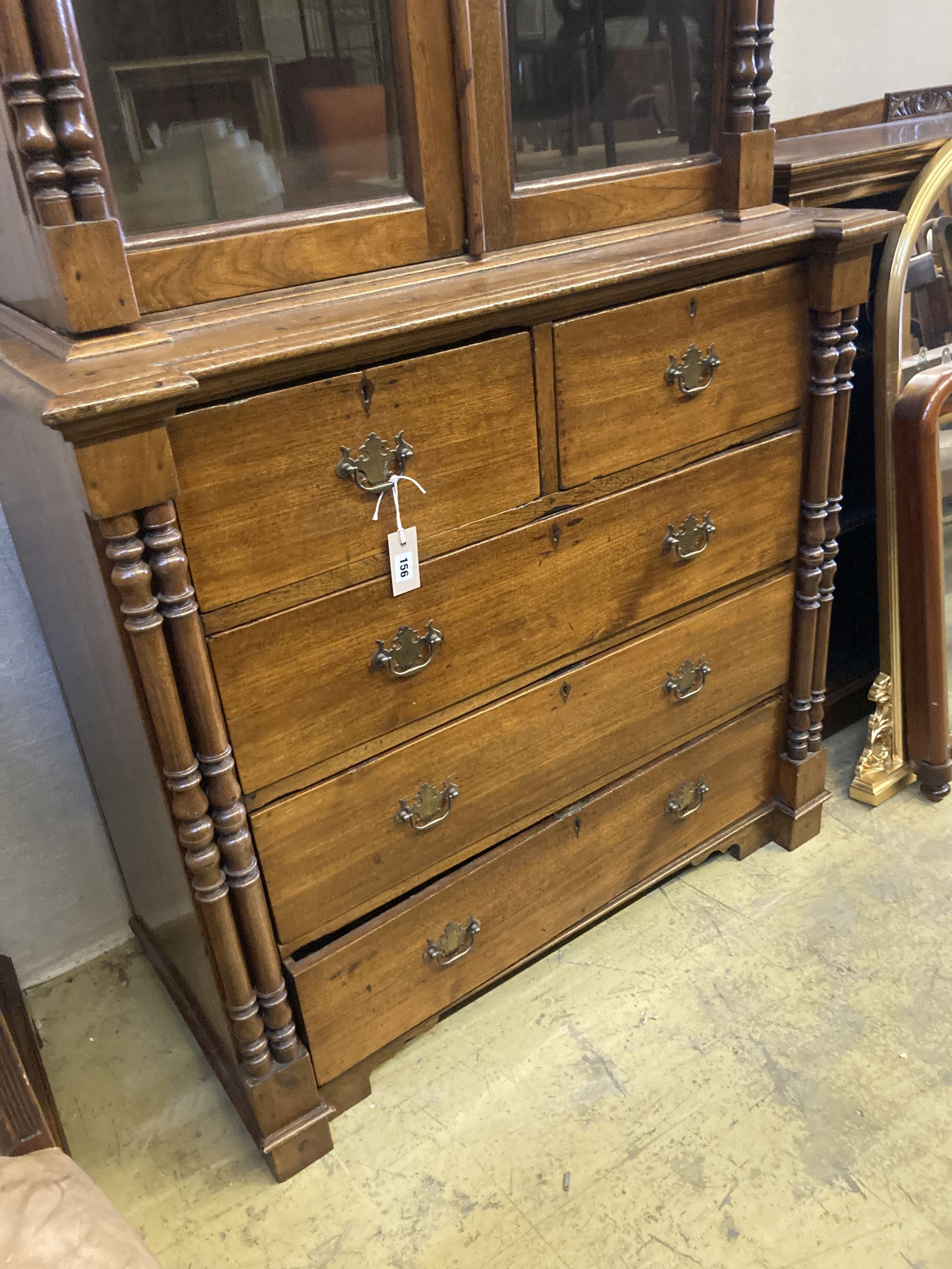 A 19th century Continental oak glazed cabinet on chest, width 104cm, depth 51cm, height 200cm